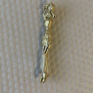Vintage  Gold Tone   Elegant Vogue Model Brooch.  Approximately 2.75” tall.